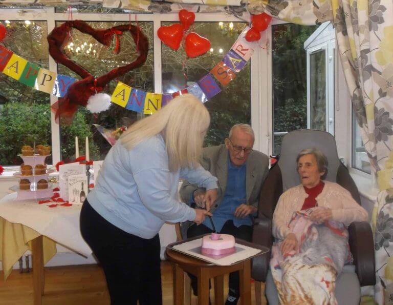 celebrating with cake cutting