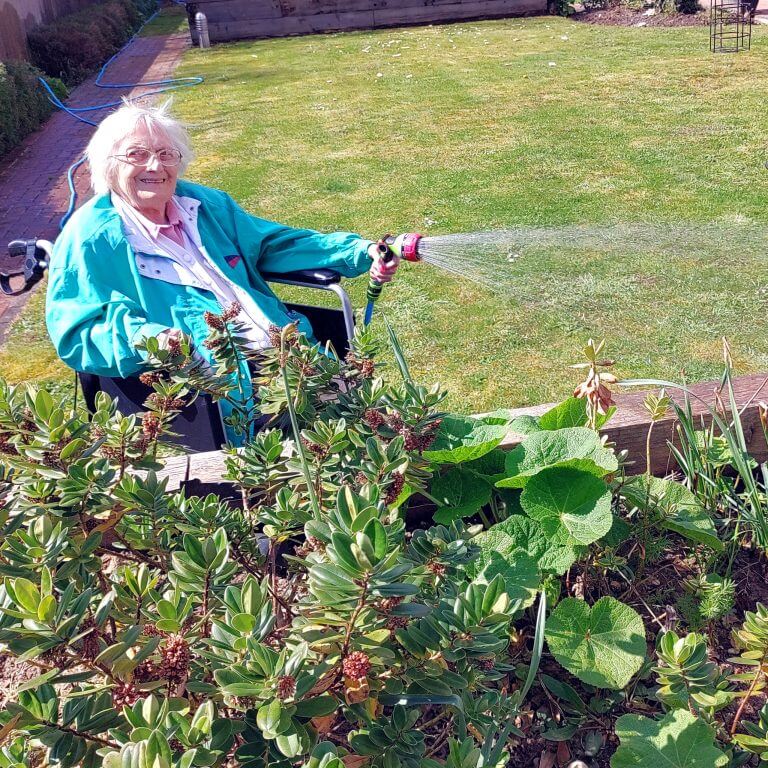 a person engaged in gardening activity