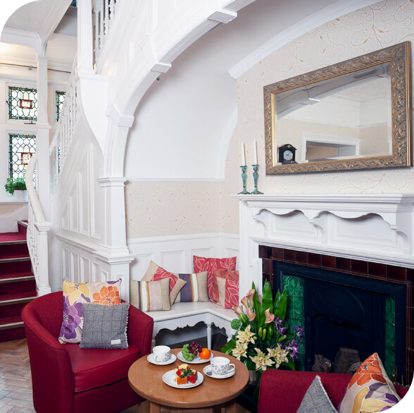 A Southborough care home living room with a fireplace