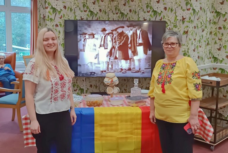 Two women standing beside