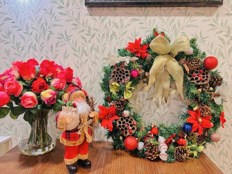 A festive display featuring a santa claus figurine